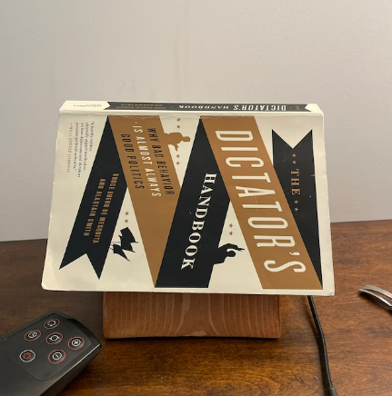 Picture of The Dictator's Handbook: Why Bad Behavior Is Almost Always Good Politics ( Book by Bruce Bueno de Mesquita ) ( Premium Paper and Matte Cover ) Novel