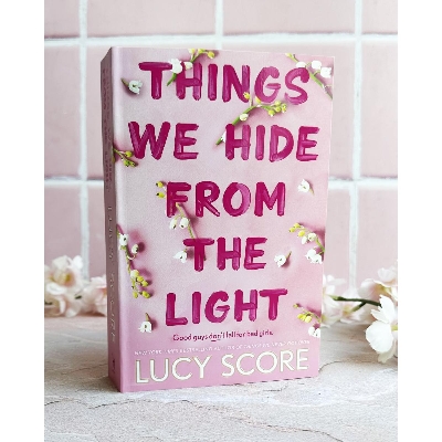 Picture of Things We Hide from the Light ( Knockemout #2 ) By Lucy Score ( Premium Paper and Matte Cover ) Novel