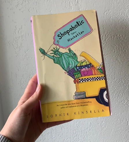 Picture of Shopaholic Takes Manhattan ( Shopaholic #2 ) ( Book by Sophie Kinsella ) ( Premium Paper and Matte Cover ) Novel