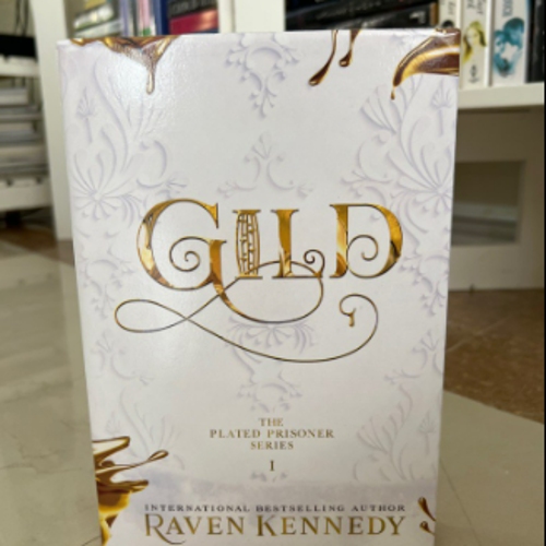 Picture of Gild ( The Plated Prisoner #1 ) ( Book by Raven Kennedy ) ( Premium Paper and Matte Cover ) Novel