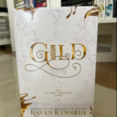 Picture of Gild ( The Plated Prisoner #1 ) ( Book by Raven Kennedy ) ( Premium Paper and Matte Cover ) Novel