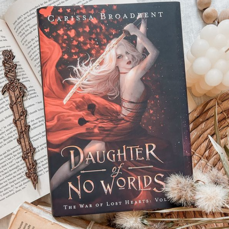 Picture of Daughter of No Worlds ( The War of Lost Hearts #1 ) ( Book by Carissa Broadbent ) ( Premium Paper and Matte Cover ) Novel