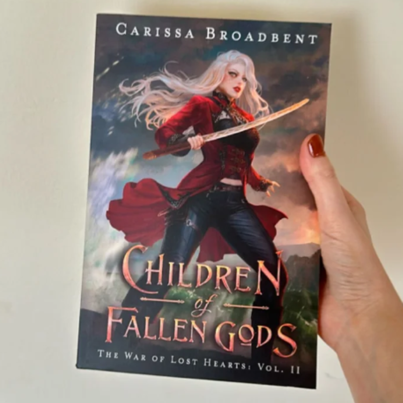 Picture of Children of Fallen Gods ( The War of Lost Hearts #2 ) ( Book by Carissa Broadbent ) ( Premium Paper and Matte Cover ) Novel