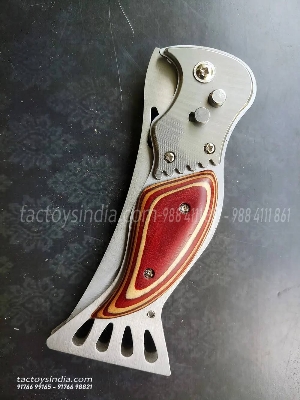 Picture of knife  kitchen with macranga cleaning garden plants