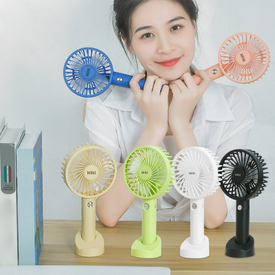 Picture of Portable USB Mini Fan Handheld Wind Power With Mobile Phone Holder Office dormitory USB Mini Handheld Fan