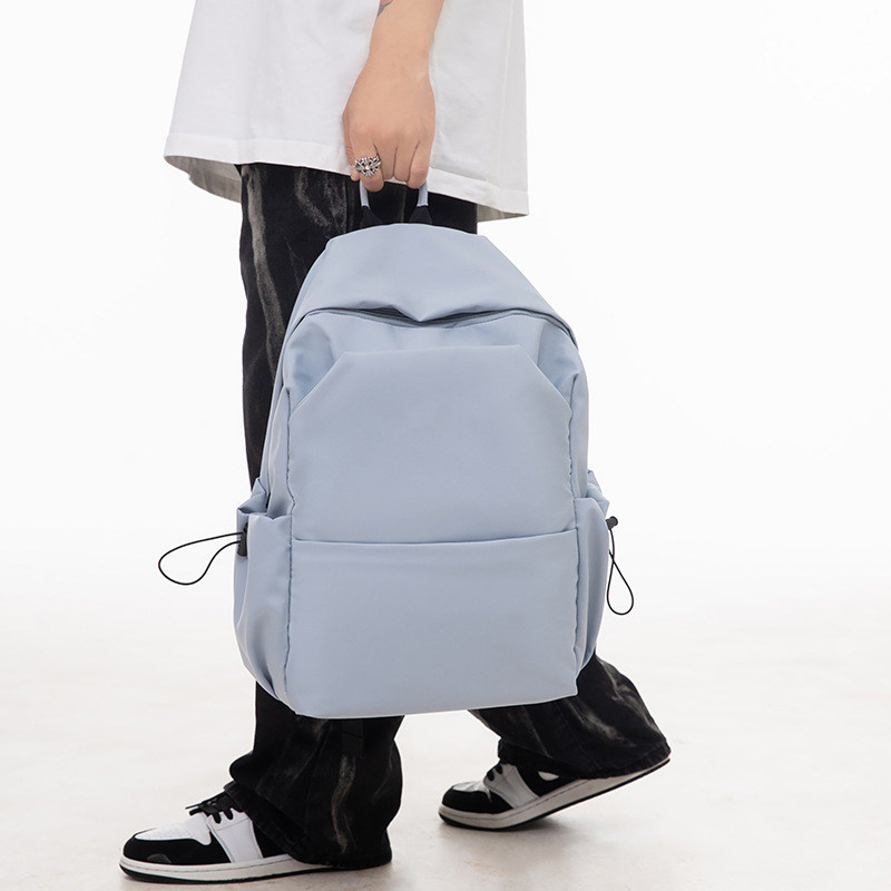 Picture of Minimalist Black Backpack for Every Day Hustle - light blue