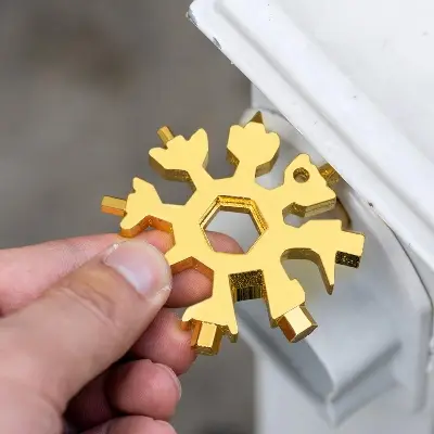 Picture of Amenitee 18-in-1 Snowflake Multi-Tool - Easy N Genius - Saker 18-in-1 Stainless Steel Snowflakes Multi-Tool (Standard, Stainless Steel)