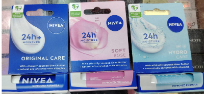 Picture of NIVEA Shine Lip Balm (4.8g), with Shea Butter Natural Oils and Vitamins 1pcs