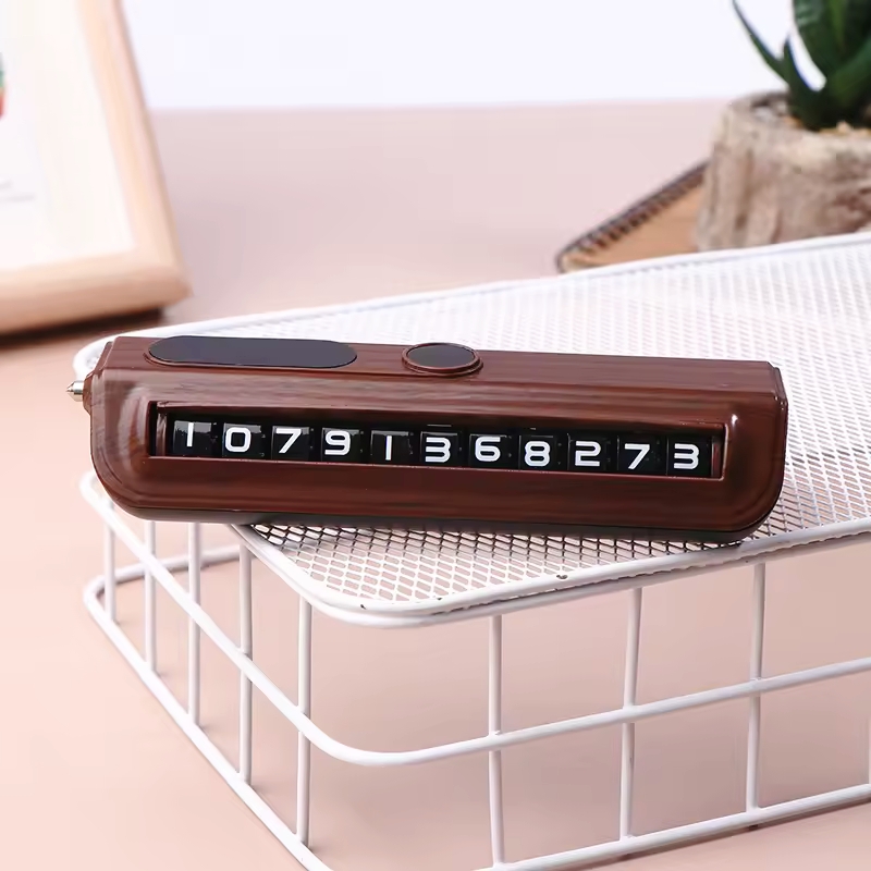 Picture of Car Parking Number Plate with Built-in Glass Breaker – Multi-Functional Emergency Tool