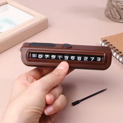 Picture of Car Parking Number Plate with Built-in Glass Breaker – Multi-Functional Emergency Tool