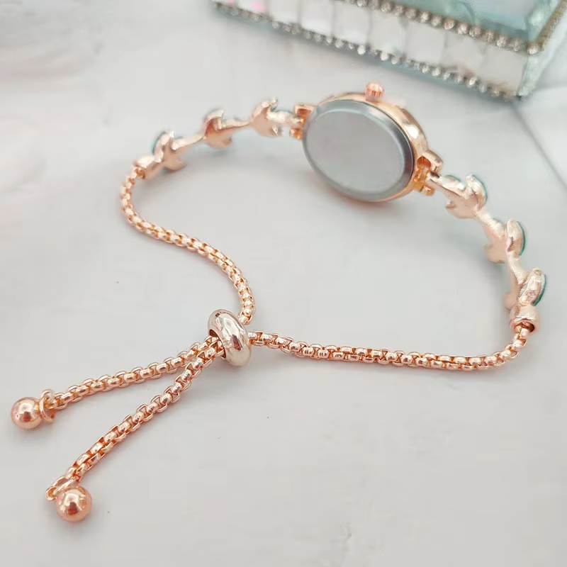 Picture of New Elegant Rhinestone Inlaid for Clover Lady Watches Oval Fashion Quartz Wristwatch Bracelet (Gold )