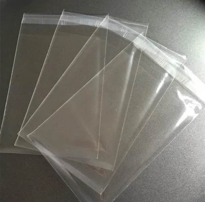 Picture of crystal cellophane poly size (8" x 12") 100 pcs for packaging material with adhesive