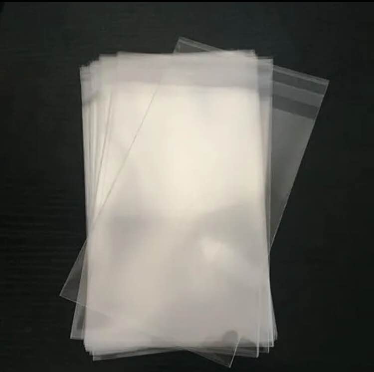 Picture of crystal cellophane poly size (8" x 12") 100 pcs for packaging material with adhesive