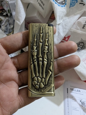 Picture of Retro Metal skull shape Refillable lighters