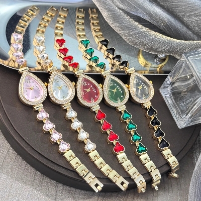 Picture of Elegant freestyle quartz watch for women with embedded diamonds, water drop shaped water box, colorful heart bracelet