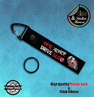 Picture of Key ring For Bike user ---- Ammu boleche Drive SloW---- Premium Quality & Plastic lock (Attachable to keys for bike, car, bag, home, and office keys)