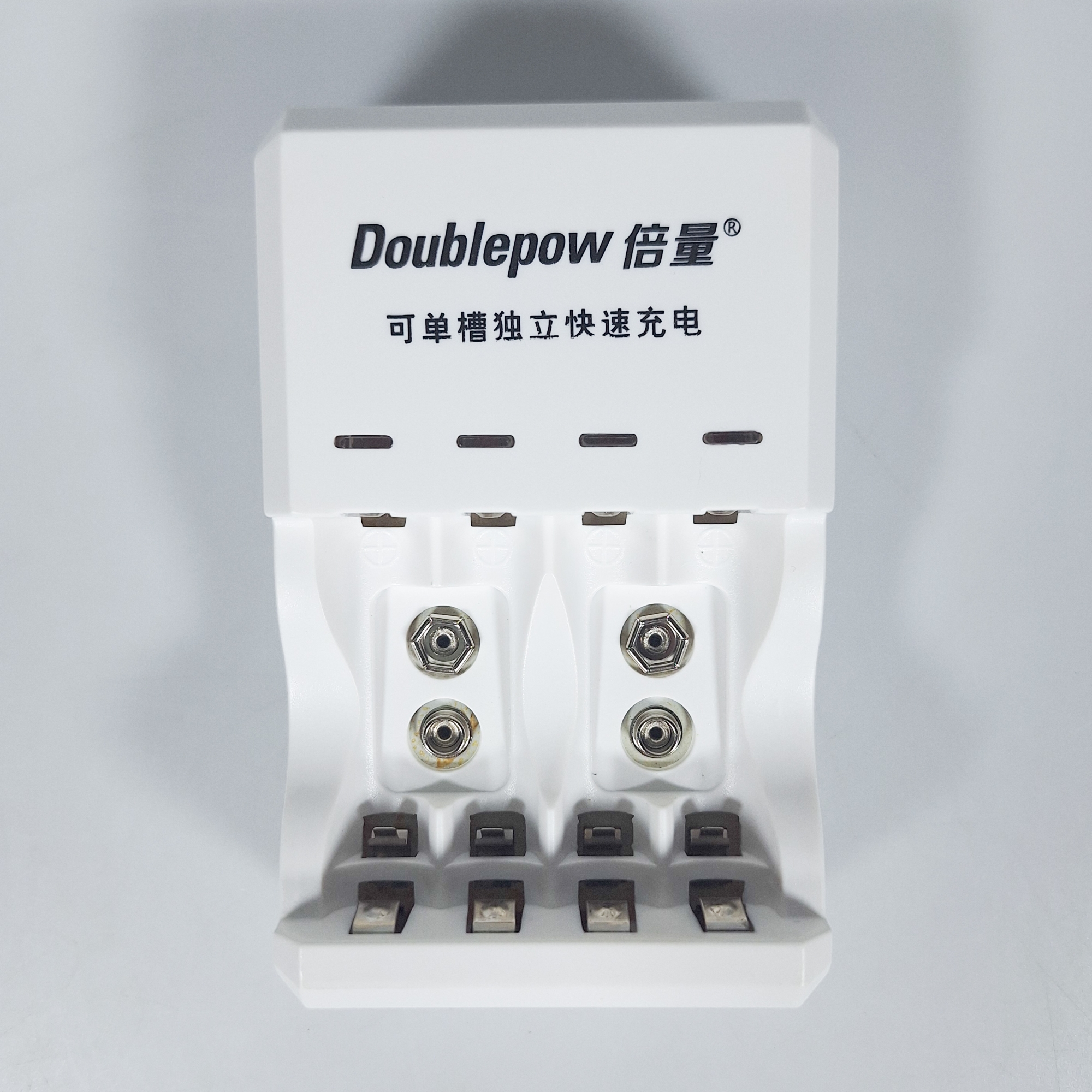 Picture of Doublepow D03 Standard Battery Charger for 1.2V  AA/AAA Size & Rechargeable 9V Ni-MH/Ni-Cd Battery (No Full Charge Indication Facility) - 1 Piece ( White )