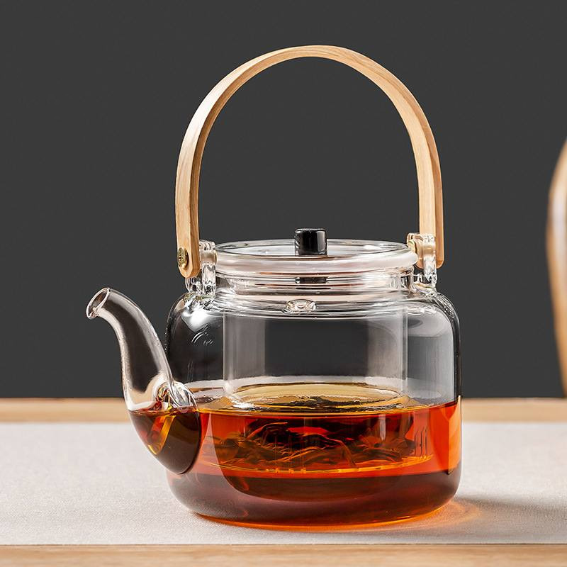 Picture of 1000ml wooden handle  Borosilicate Glass Teapot, Loose Leaf Tea Kettle, Borosilicate Glass Heat Resistant Clear Leaf Teapot with glass Infuser Strainer for Microwavable and Stovetop Safe(1000ml glass kettlee)