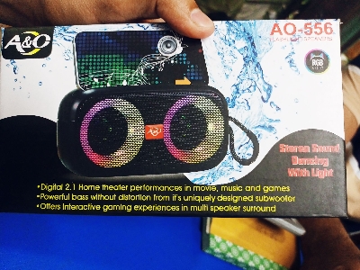 Picture of AQ-556 RGB Flashlight Wireless Bluetooth Speaker | FM Radio | Stable Performance | Bluetooth 5.0 Portable Speaker - Multicolor