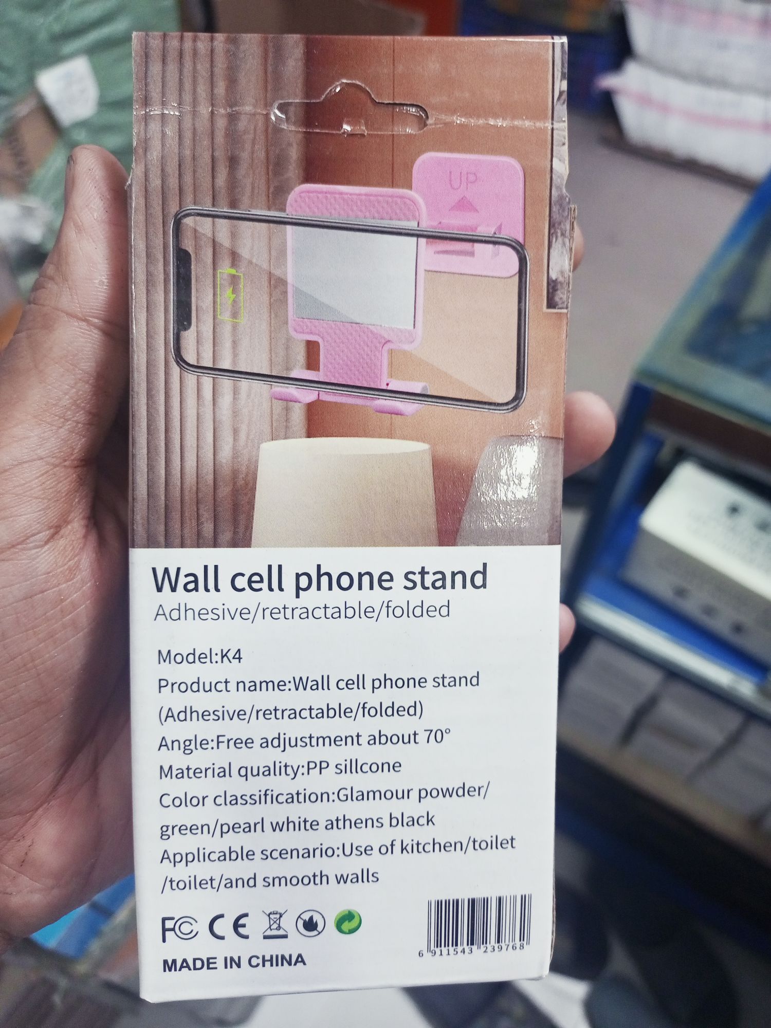 Picture of Adjustable Foldable Wall Phone Holder – Non-Slip Mobile Stand | Stick-On Wall Mount for Bedroom, Kitchen & Desk - Black