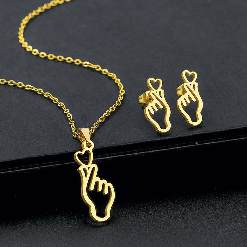 Picture of Fashionable And Creative Light Luxury Design Metal Hollow Hand Heart  Necklaces For Women