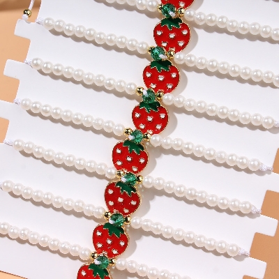 Picture of fashionable imitation pearl beaded red cherry strawberry pendant woven sweet ladies' bracelet