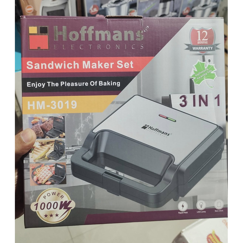 Picture of 3_in_1 Functionality: This appliance includes interchangeable plates for making sandwiches, waffles, and grilling. - Silver