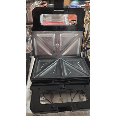 Picture of 3_in_1 Functionality: This appliance includes interchangeable plates for making sandwiches, waffles, and grilling. - Silver