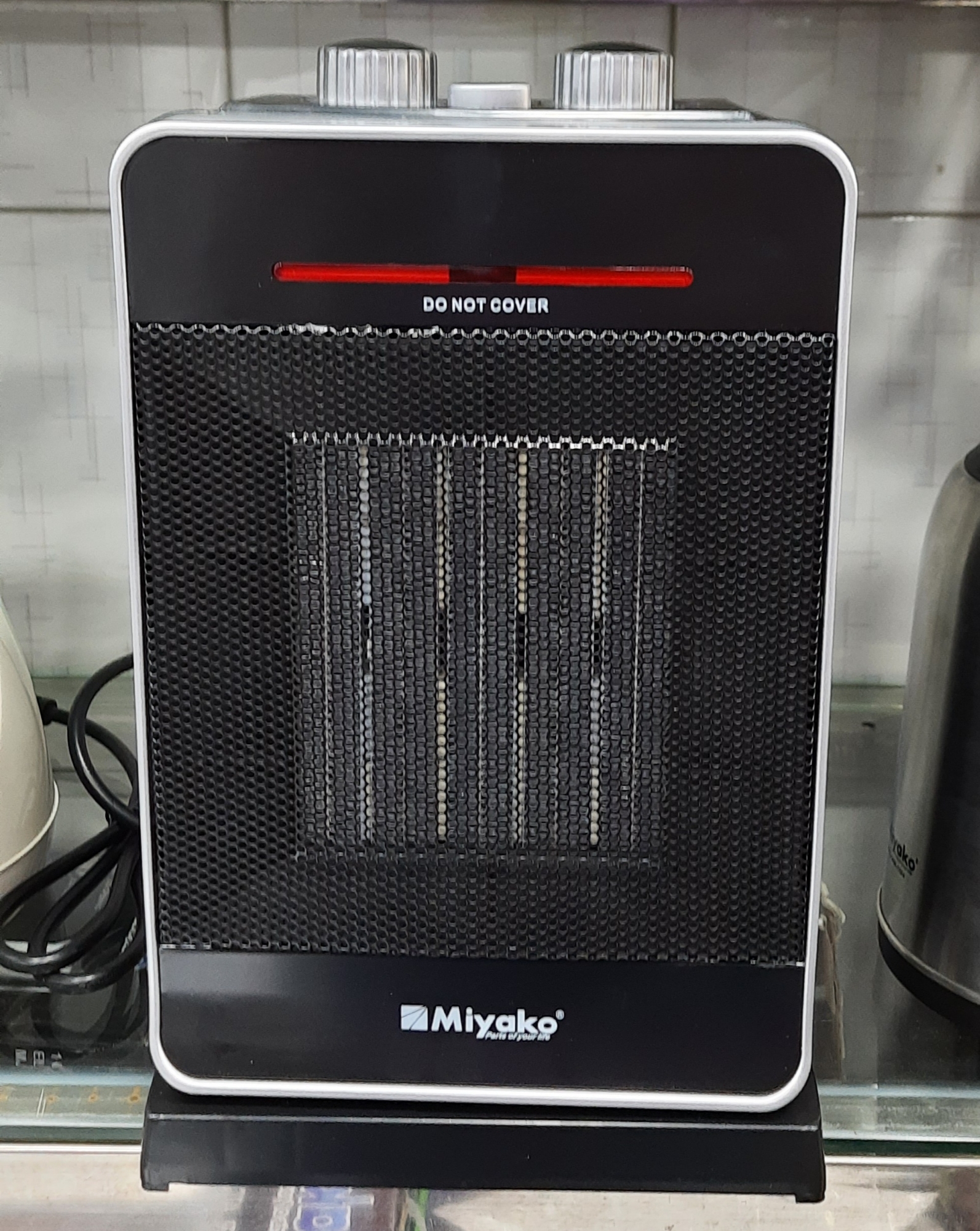 Picture of Miyako PTC-602 Oscillating 2000W PTC Ceramic Room Heater – Fast Heating for 400 sq-ft Rooms Heater with Overheat & Tip-Over Protection (Black)