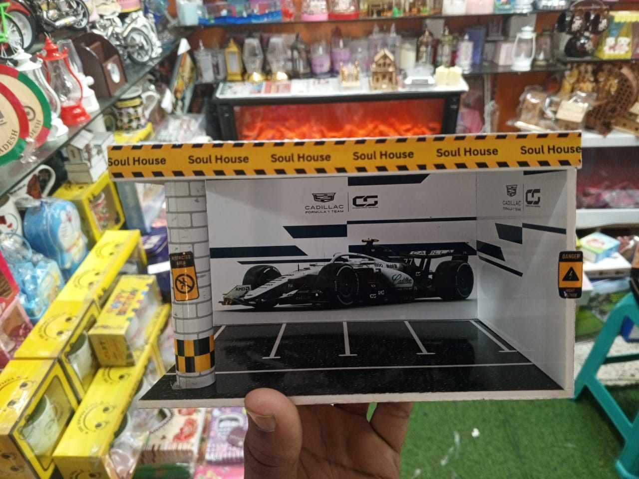 Picture of small-scale model F1 car display case or diorama,