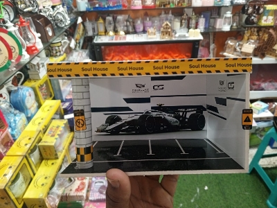 Picture of small-scale model F1 car display case or diorama,