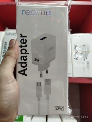 Picture of Realme 33W Super Dart Fast Charging PD Power Adapter, which includes a USB to Type-C cable.