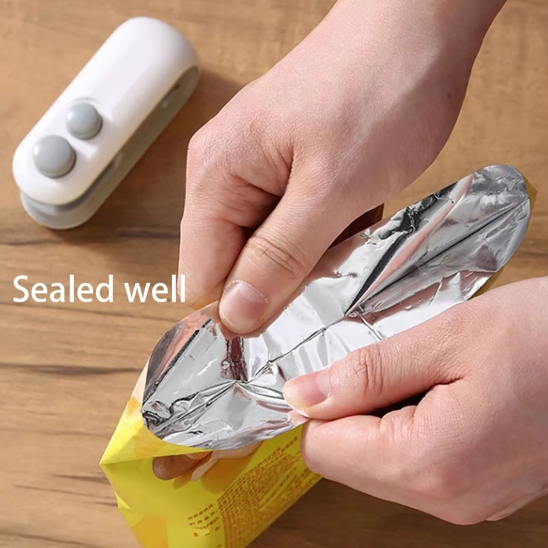 Picture of Mini Plastic Bag Sealer Portable Food Snack Sealing Machine USB Rechargeable Hand Pressure Heat-sealing Device