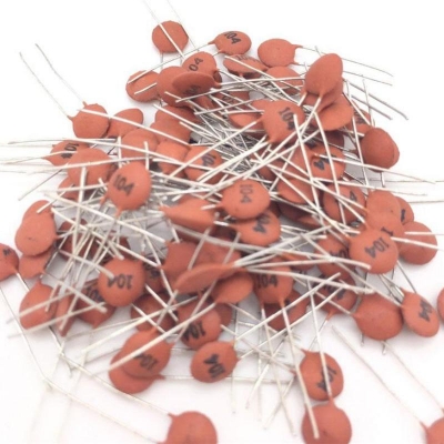 Picture of 100pcs Ceramic capacitor 50V 104 100nF 0.1uf 50V 104 Brown