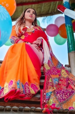 Picture of New Exclusive Design Orange Color Weightless Soft Silk sequence dollor work Saree for women - Orange