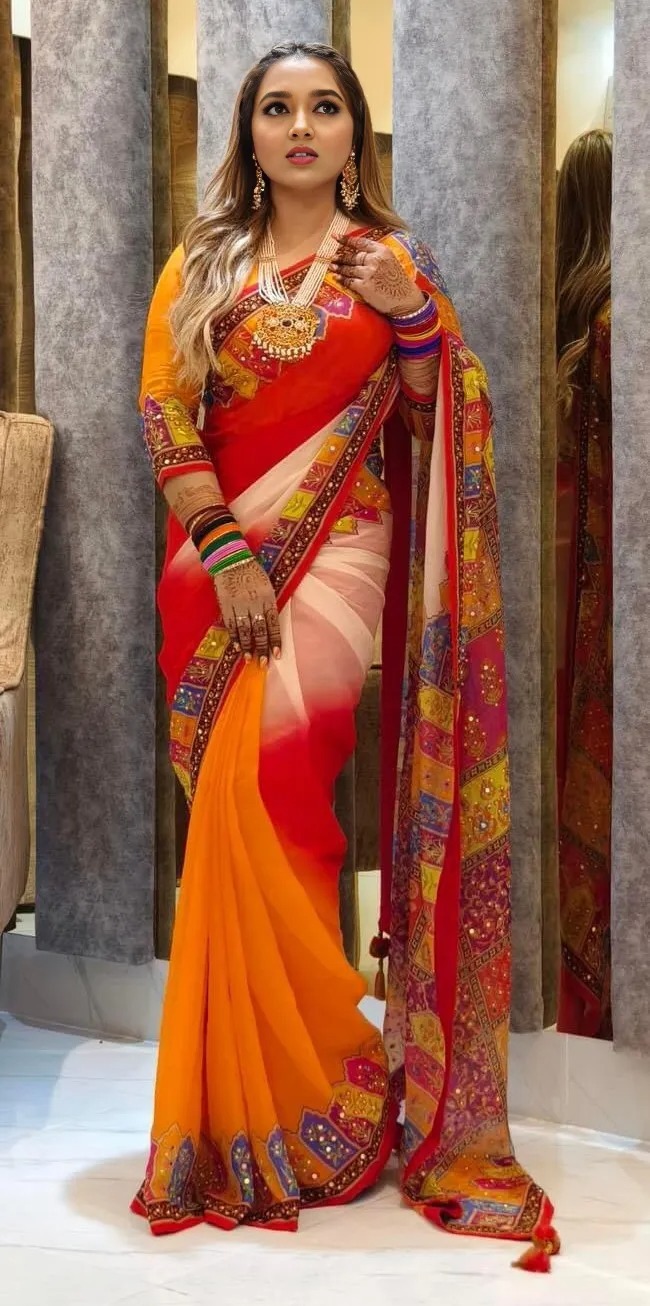 Picture of New Exclusive Design Orange Color Weightless Soft Silk sequence dollor work Saree for women - Orange