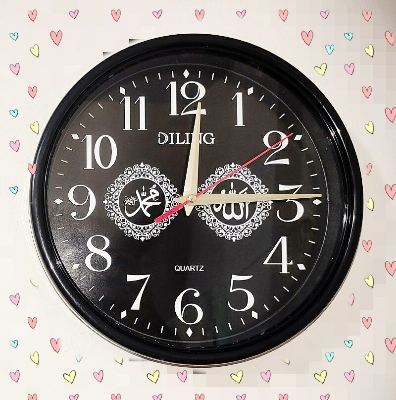 Picture of Beautiful Stylish Wall Clock with Fabric and Plastic Design for Elegant Home
