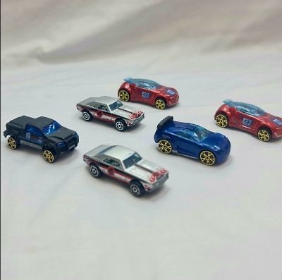 Picture of Hot Wheels new collection 2024 Basic Car H Assortment, 3 Mini Cars in Box Sale, Ages 3 and UpMcLAREN F1 GTR hot wheels
