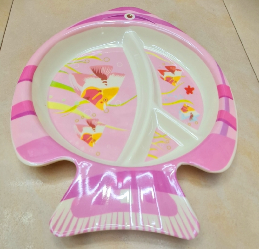 Picture of This colorful Fish Plate Makes Mealtime a fin-tactic Adventure! Divided sections keep portions playful, while the non-slip base helps prevent spills. Made from safe, durable materials, it's perfect for tiny hands and growing appetites