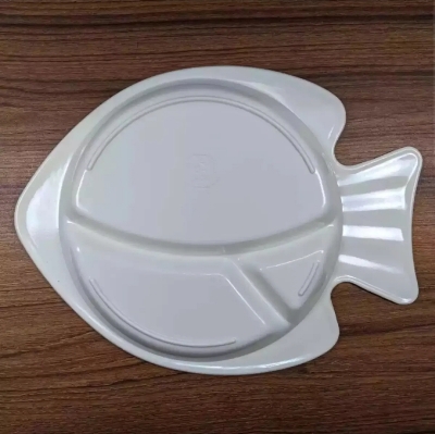 Picture of This colorful Fish Plate Makes Mealtime a fin-tactic Adventure! Divided sections keep portions playful, while the non-slip base helps prevent spills. Made from safe, durable materials, it's perfect for tiny hands and growing appetites