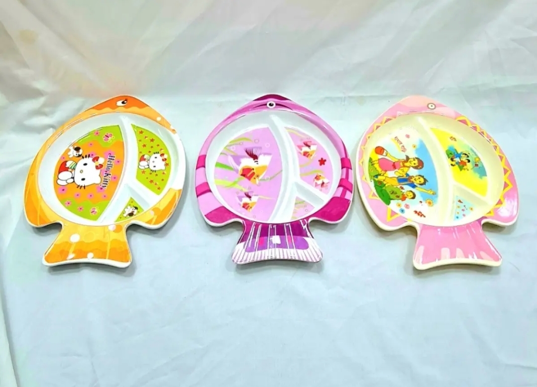 Picture of This colorful Fish Plate Makes Mealtime a fin-tactic Adventure! Divided sections keep portions playful, while the non-slip base helps prevent spills. Made from safe, durable materials, it's perfect for tiny hands and growing appetites