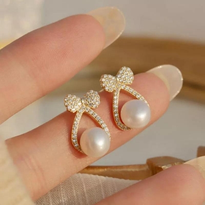 Picture of Cute Simple  Petite Bow Pearl high Sense Earrings  Female Student Fresh Asymmetric Earrings