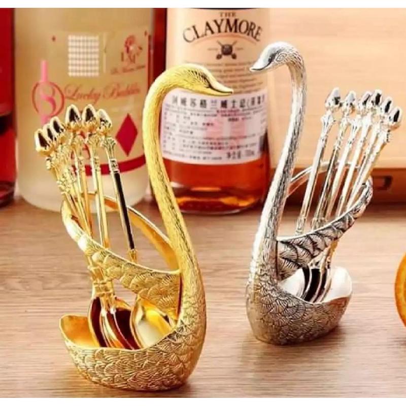 Picture of Spoon Set with Swan Stand This spoon set increases dining table beauty 6 spoons and a swan shape stand.