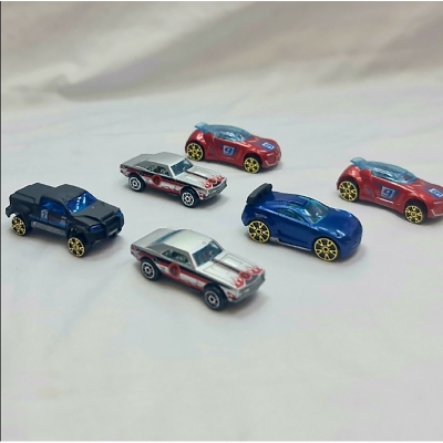 Picture of Hot Wheels new collection 2024 Basic Car H Assortment, 3 Mini Cars in Box Sale, Ages 3 and UpMcLAREN F1 GTR hot wheels