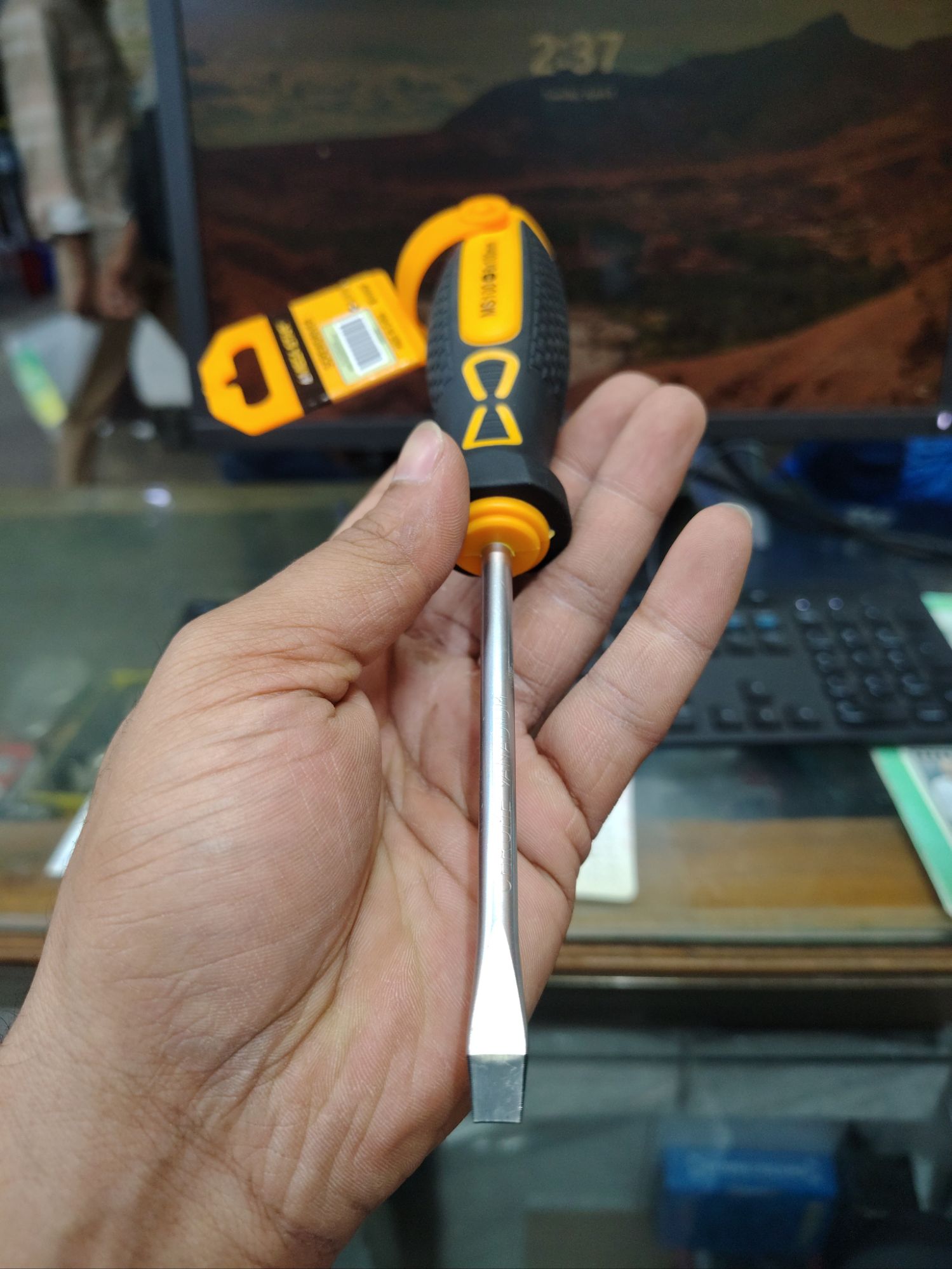 Picture of 🛠️ WELLOO 4-Inch Flat Head Screwdriver | Slotted Multi-Purpose Hand Tool – SDR05100 (Yellow)