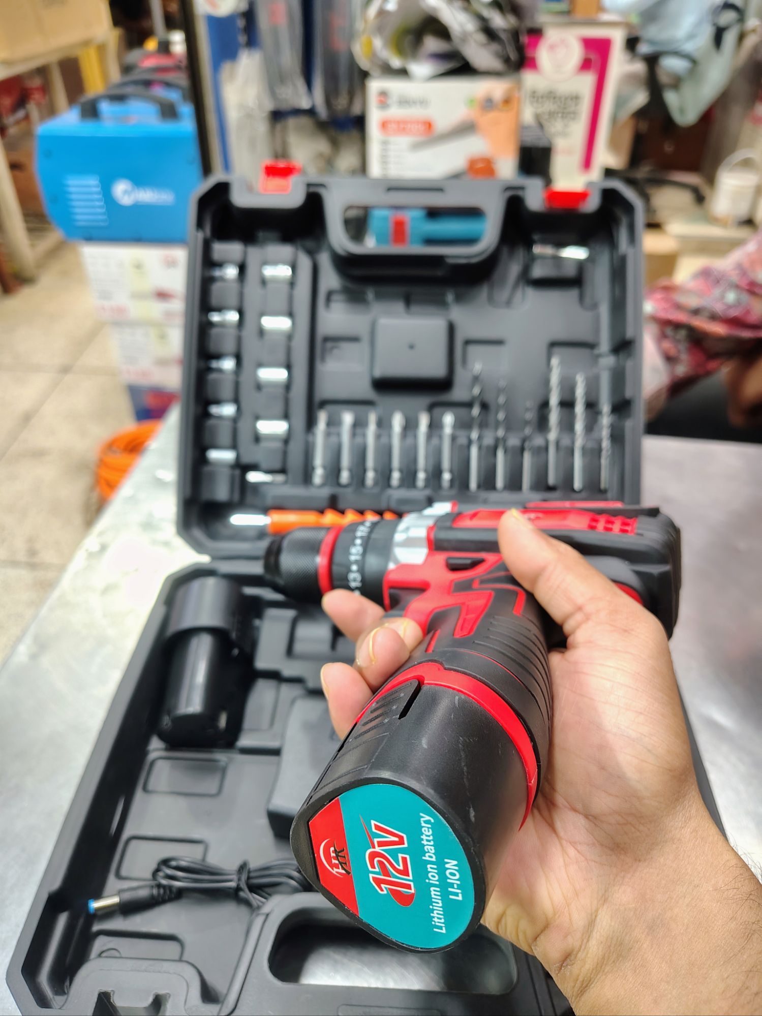 Picture of ⚡ HR 12V Cordless Drill Machine – Compact & Lightweight Power Tool (2pcs Set) (Red)