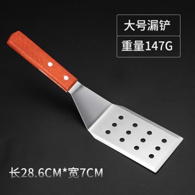 Picture of stainless steel spatula with a wooden handle
