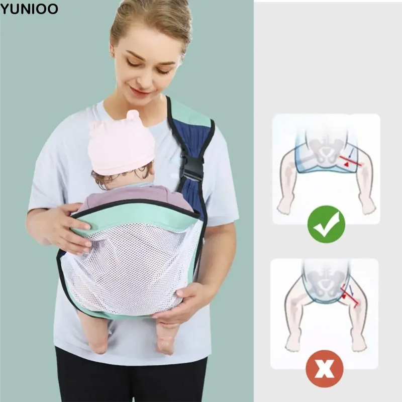 Picture of Newborn Baby Holding Carrier Bag