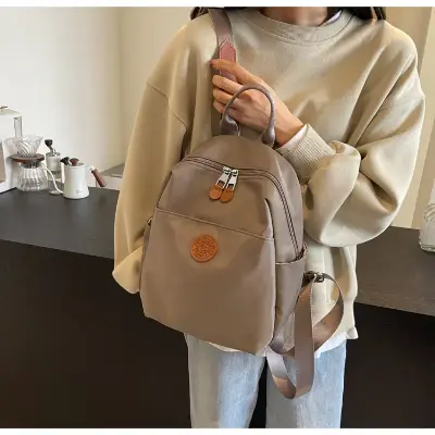 Picture of 2025 New Hot Women's Backpacks Designer High Quality Soft Nylon Simple Fashion Bag(khaki)