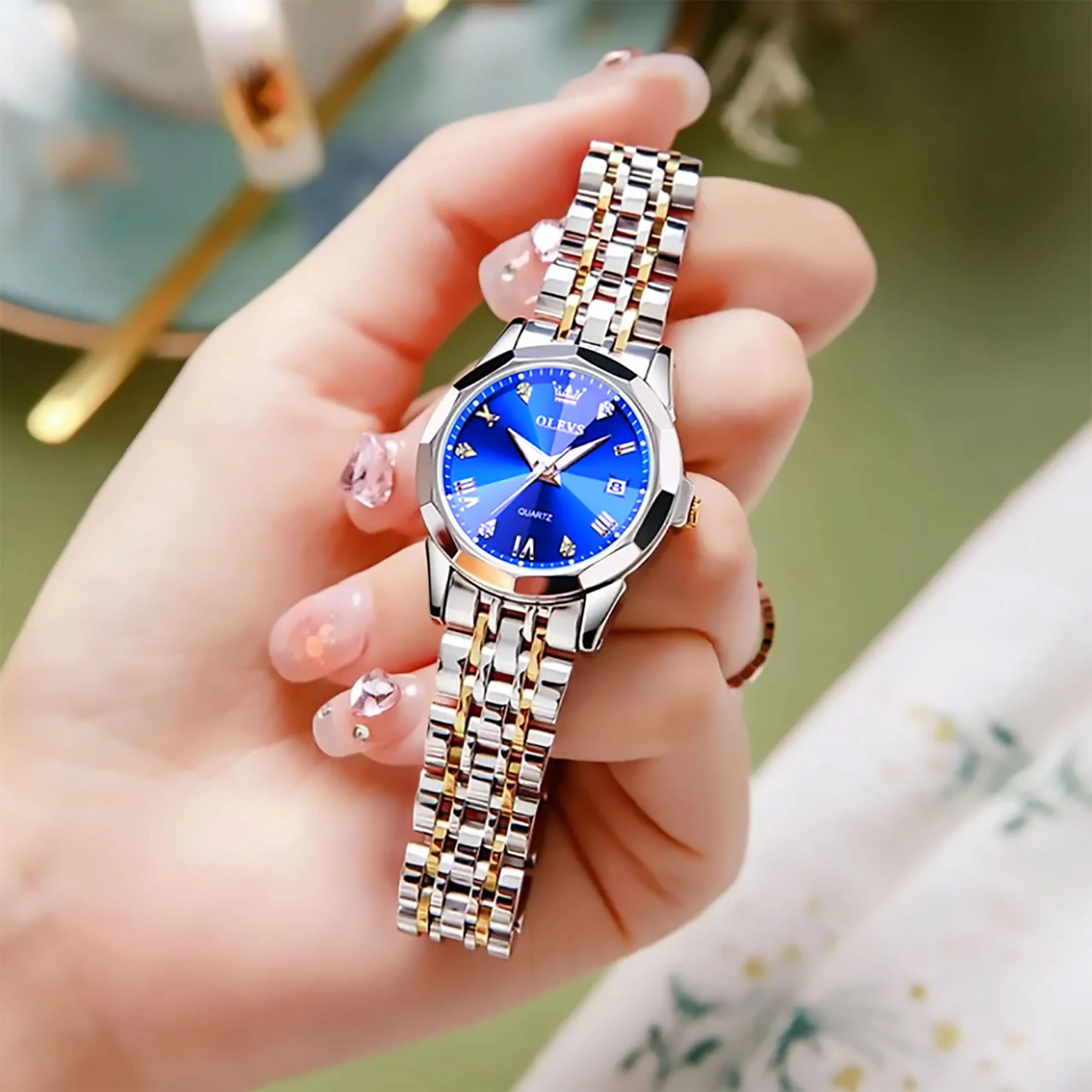 Picture of OLEVS Watch for Women Branded Stainless steel Elegant Luminous Ladies Watches 9931 Silver Royal Blue